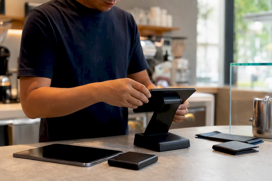 Hands configuring payment terminal device
